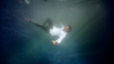 Man drowning in swimming pool